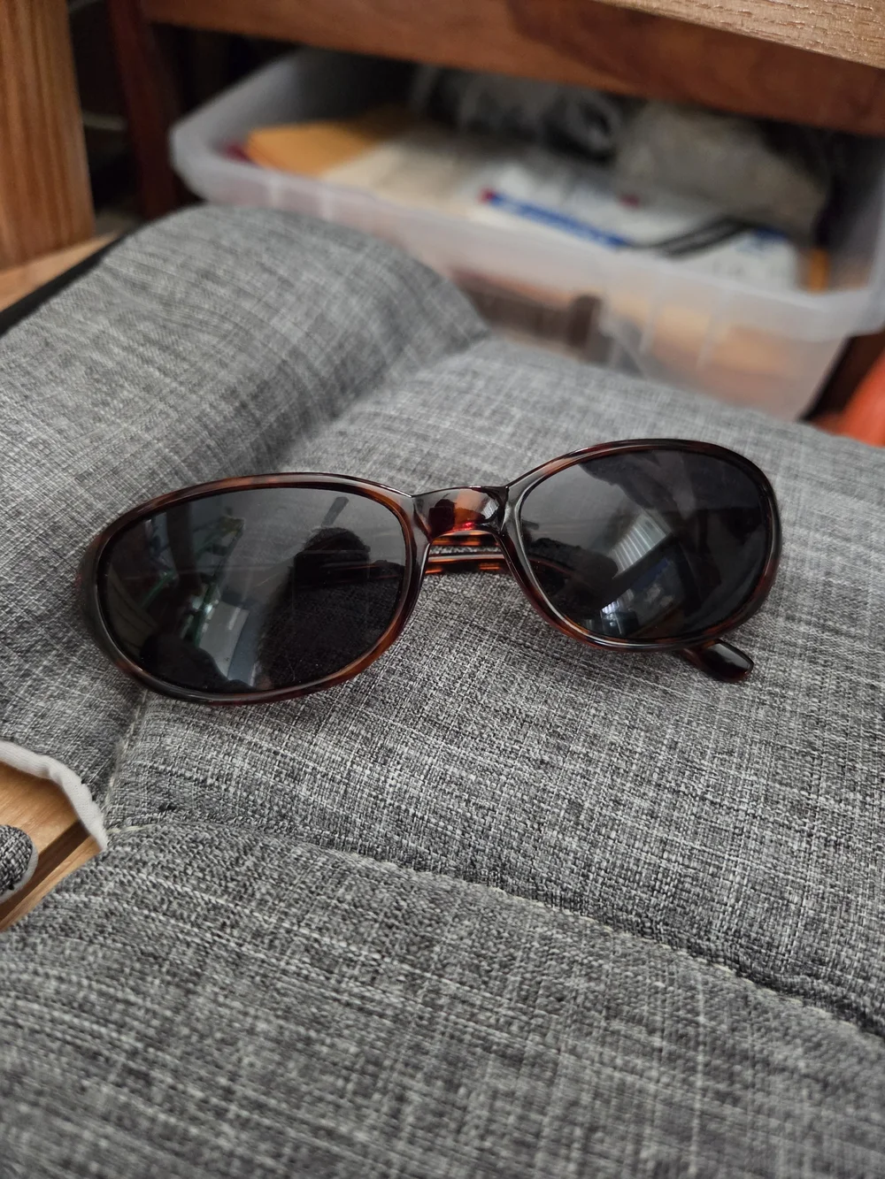 Tortoiseshell Oval Sunglasses with Dark Lenses.  Blue Blocker